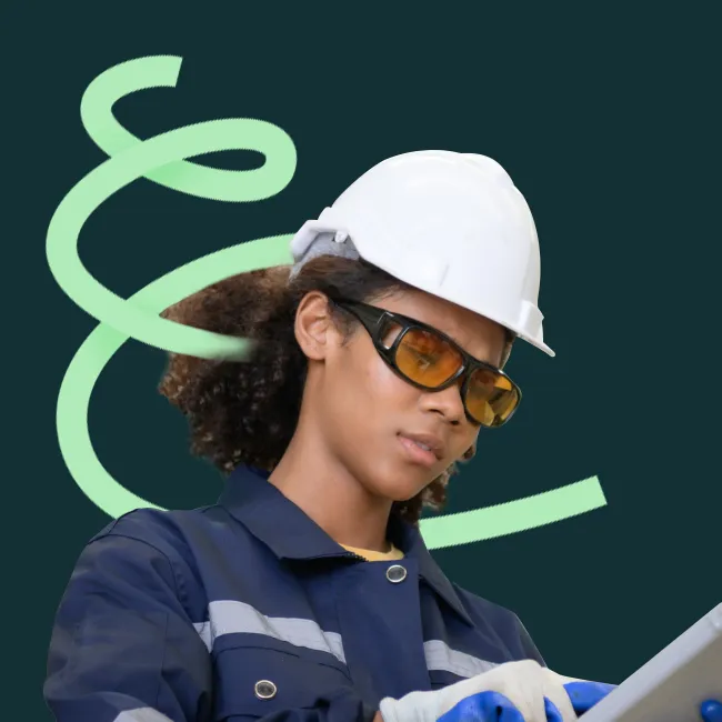 Apprentice in a hard hat on site