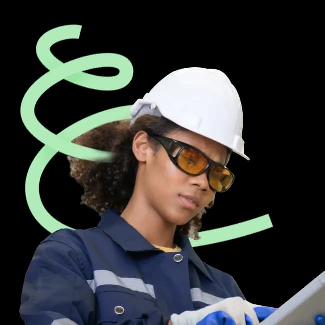 Apprentice in a hard hat on site